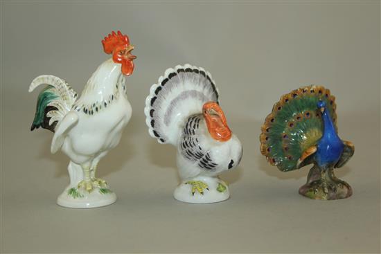 Three Meissen figures of a cockerel, a turkey and a peacock, late 19th century, 6.5cm-9cm